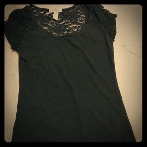 A lacy black short sleve shirt